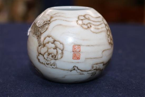 A Chinese miniature water pot and a jar cover